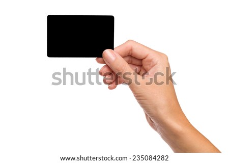 Close up of woman's hand holding blank black card. Studio shot isolated on white.