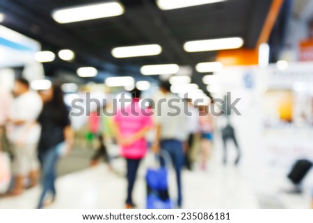 Abstract blurred people walking in shopping center