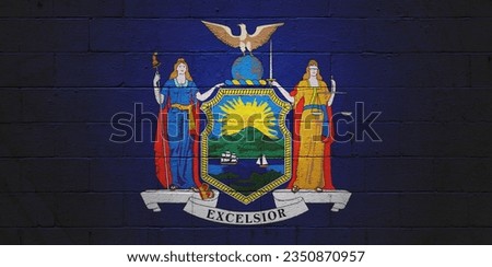 Flag of New York painted on a cinder block wall.