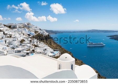 White architecture in Santorini island, Greece. Beautiful sea view in sunny day. Travel and vacation concept Royalty-Free Stock Photo #2350873855
