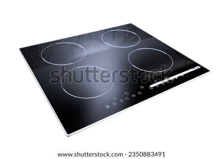 Grey countertop with black glossy built in ceramic glass induction or electric hob stove cooker with four burners isolated on white background. Royalty-Free Stock Photo #2350883491