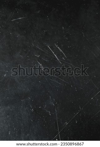 Dusty scratched and scanned old film texture, White dust and scratches on black background great for overlays, Dusty scratched grunge scanned old film texture Royalty-Free Stock Photo #2350896867
