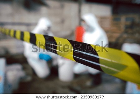 Barrier Tape for Area Closed or Keeping Area for Chemical Spill Clean-up, Dangerous Zone, Part of Steps for Dealing with Chemical Spillage, Spill Clean-up Procedures. Royalty-Free Stock Photo #2350930179
