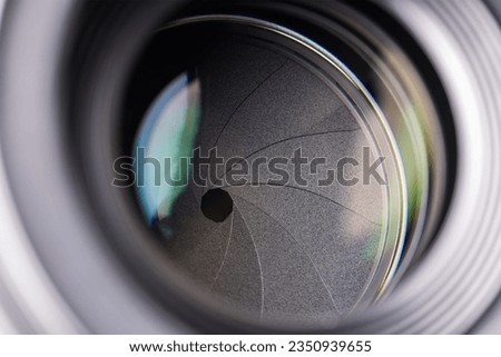 Changing aperture camera lens close up