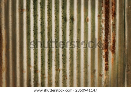 Old zinc vintage fence wall texture for background, pattern of rusty on metal panel.