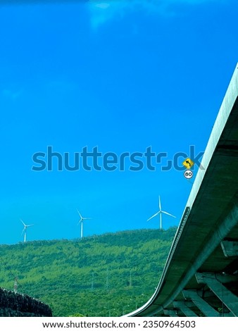 Motorway and hill windmill views