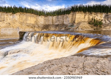 Louise Falls on the Hay River in Canada's Northwest Territories Royalty-Free Stock Photo #2350985969