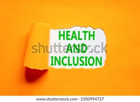 Health and inclusion symbol. Concept words Health and inclusion on beautiful white paper. Beautiful orange background. Business motivational health and inclusion concept. Copy space.