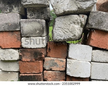 Curved rocks and colorful bricks. Royalty-Free Stock Photo #2351002999