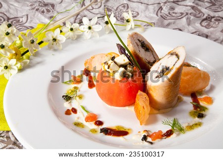 Stuffed Tomato with Chicken Roll. Photo, picture