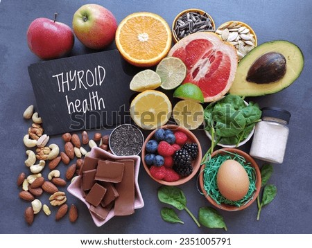 Foods for healthy thyroid. Variety of natural healing foods that nourish the thyroid gland. Assortment of natural products to boost thyroid health. Concept of diet, super food for thyroid health. Royalty-Free Stock Photo #2351005791