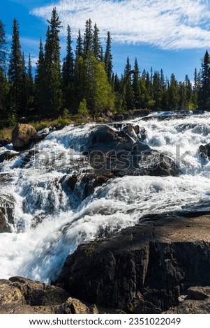 Cameron River Falls in Hidden Lake Territorial Park, Northwest Territories, NT Canada Royalty-Free Stock Photo #2351022049