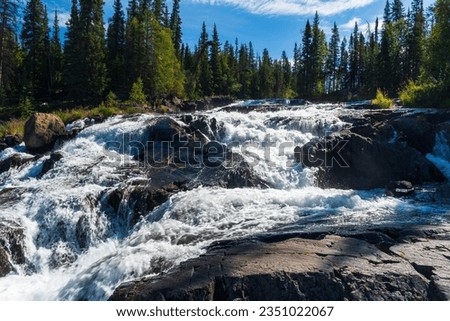 Cameron River Falls in Hidden Lake Territorial Park, Northwest Territories, NT Canada Royalty-Free Stock Photo #2351022067