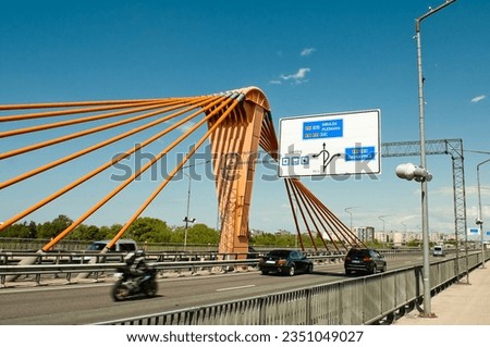 Riga, Latvia - May 22, 2023: road sign pointer on the road bridge.