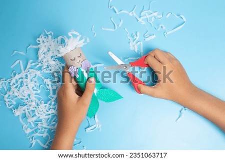 craft toy from a toilet roll, the little mermaid Royalty-Free Stock Photo #2351063717