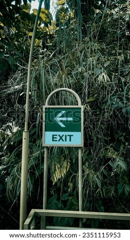 Exit sign in nature outdoors building