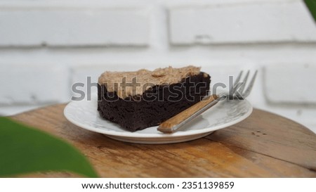 a slice of brownies cake isolated on white