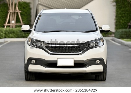 white car front view See clearly, double headlights, hood. Royalty-Free Stock Photo #2351184929