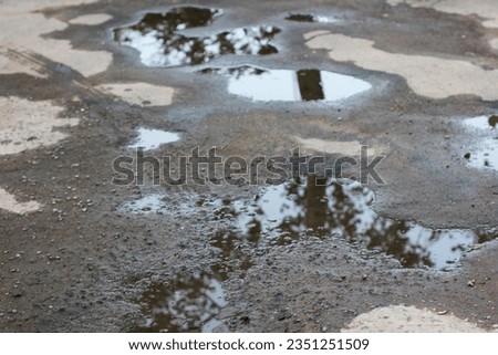 puddle on asphalt after rain