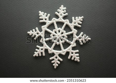 white snowflake on a gray background, Christmas decoration