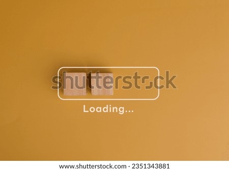 Wooden cube blocks with loading bar progress concept. Business idea progress plan strategy concept on yellow background. Royalty-Free Stock Photo #2351343881