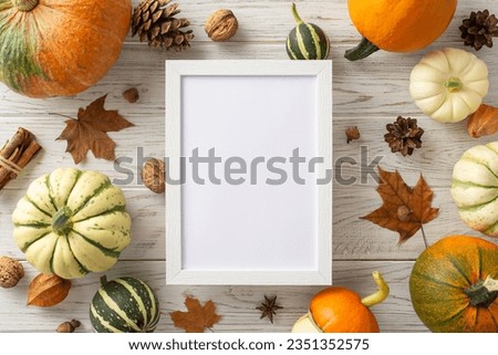 Celebrate the autumn harvesting scene. Top-down image showcases ripe pumpkins and quintessential fall items on a white wood isolated background, leaving space for text or adverts to enhance the them