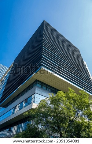 Close-up of a modern business city building looking up