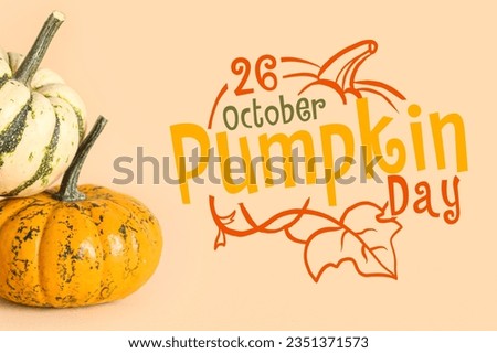 Different pumpkins on beige background. National Pumpkin Day