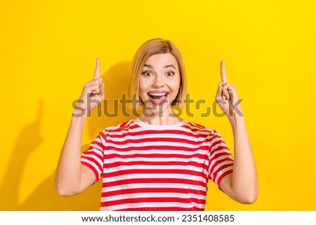 Photo of cheerful satisfied girl open mouth wear trendy summer demonstrate cool novelty empty space isolated on yellow color background