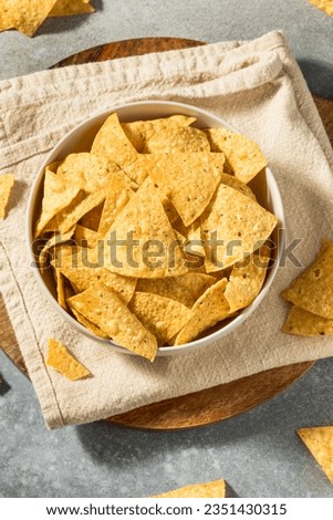 Homemade Triangle Tortilla Corn Chips in a Bowl Royalty-Free Stock Photo #2351430315