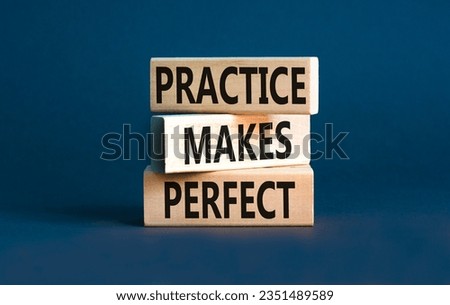 Practice makes perfect symbol. Concept words Practice makes perfect on wooden block. Beautiful grey table grey background. Business practice makes perfect concept. Copy space. Royalty-Free Stock Photo #2351489589