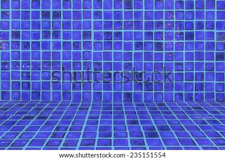 An image of tiles floor background and blue tile wall high resolution real photo
