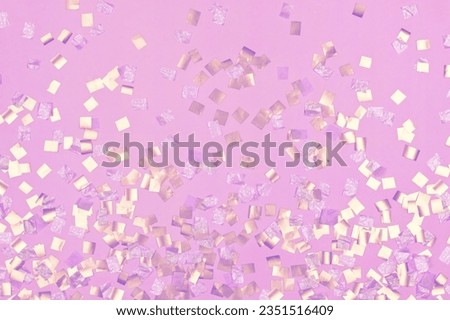 gold square sequins on pink background