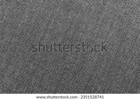 Carbon fiber background. Texture of black fabric for tailoring, Cloth. Textile. Fabric