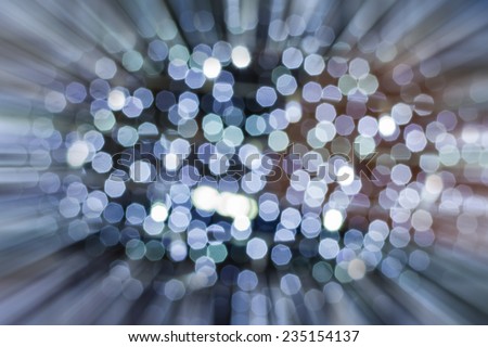 Blue bokeh of Christmas light with zoomed in effect border