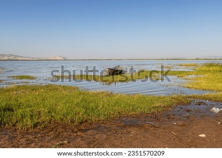 Civril, Denizli, Türkiye, 10 July 2023; Water pollution and drought problem in Işıklı Lake, where fishing boats descend, global warming.