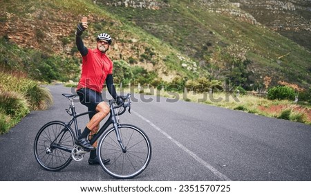 Selfie, mountain and man cycling for exercise, training and workout goals in nature for social media. Sports, travel blog and male cyclist take picture for wellness, cardio and fitness on adventure