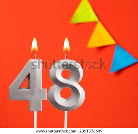 Birthday card - Number 48 candle in orange background