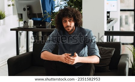 Middle eastern man on telework videocall, presenting new vision to improve small business plan. Startup consultant meeting with ceo on online videoconference, management strategy. Tripod shot. Royalty-Free Stock Photo #2351582953