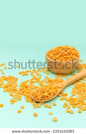 soy beans in soy beans in wooden spoon, top view