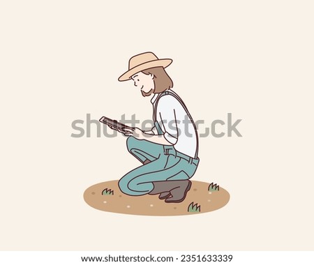 Farmer woman working with tablet on field. Hand drawn style vector design illustrations. Royalty-Free Stock Photo #2351633339