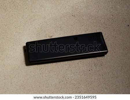 Black remote image without buttons
