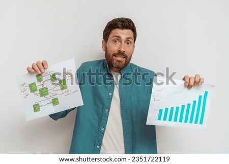 Destruction entrepreneur or salesman showing his charts sales and business plan on white background