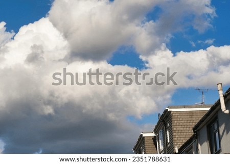 Low Angle Camera Footage of Dramatic Clouds and Blue Sky over The Luton City of England UK. August 6th, 2023