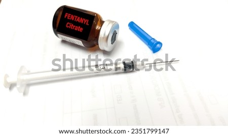 Fentanyl Citrate Solution for analgesic treatment. Doctor holding injection of medication of Fentanyl is opioid used to palliate pain or for anesthetic Royalty-Free Stock Photo #2351799147