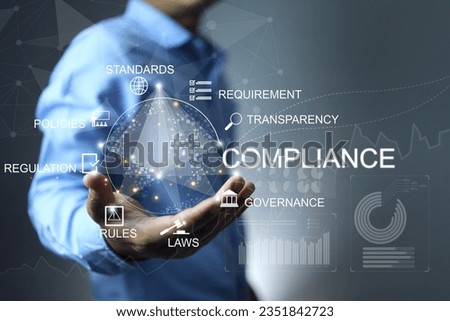 compliance concept businessman holding a key of process to products export and import goods foreign countries meet governance requirement before trade or do business. Regulation and standardization Royalty-Free Stock Photo #2351842723