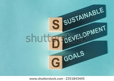 SDG letters on wooden blocks. Sustainable Development Goals concepts. Royalty-Free Stock Photo #2351843445