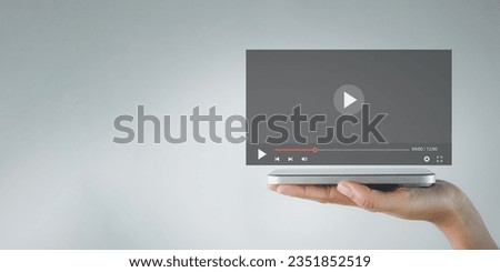 Streaming Online,Social Media,Live Concert,Internet Concept.,Hand holding smartphone with video interface over white background with copyspace.