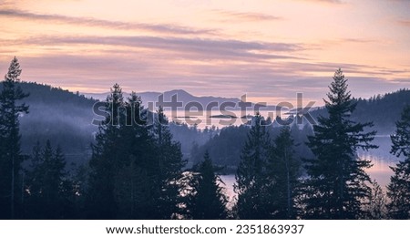 Sunset over sea bay in Madeira park. Sunshine Coast, British Columbia, Canada Royalty-Free Stock Photo #2351863937