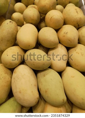 Closeup of yellow ripe mangoes